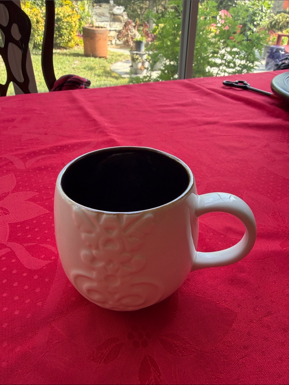 Starbucks White Ceramic Mug with Black Interior and Embossed Design